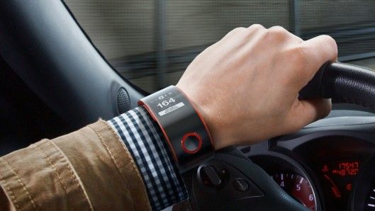A driver sporting a smartwatch